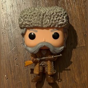 Funko Pop Figure with Gray Hat and Brown Outfit
